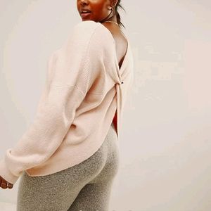 Pink wrap-back sweater